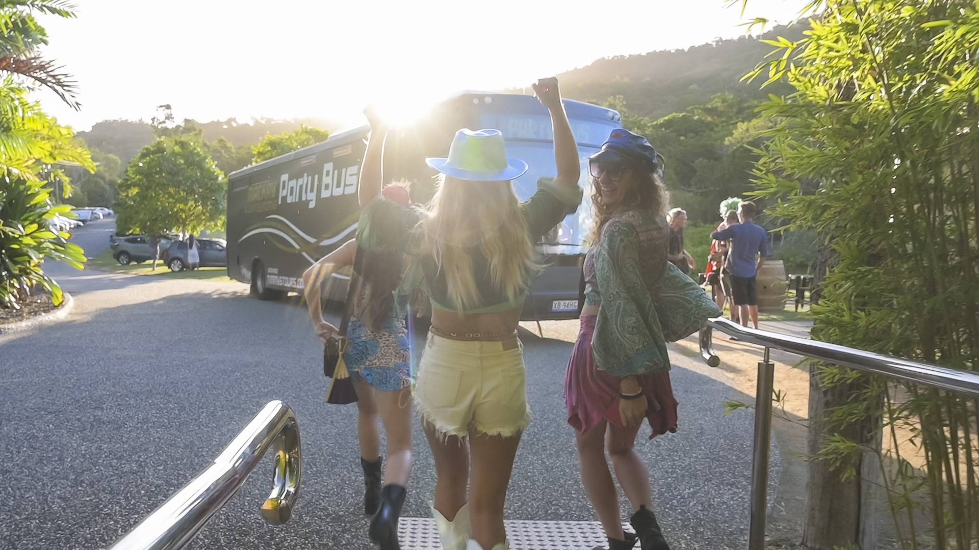 Whitsunday Party Bus Girls out front sun beams